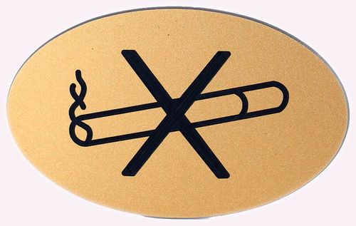 Tupakointi kielletty -seinäk. ovaali, kulta/musta 7,5 x 4,5 cm